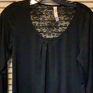 Woman’s black scoop neck blouse